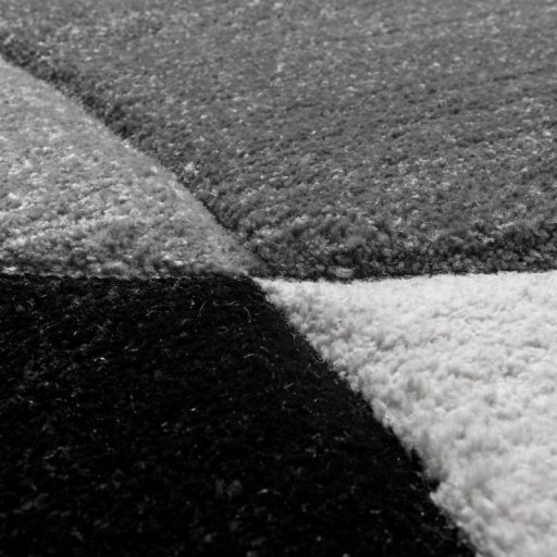 Nappali szonyeg, szurke-fekete absztrakt mintaval 60x110 cm