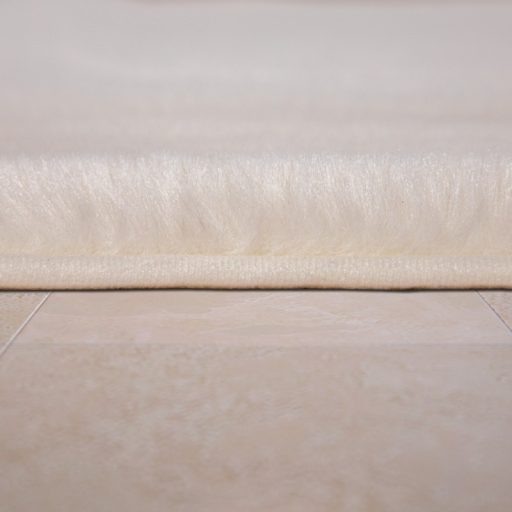 Egyszínű puha hosszú szálú fürdőszoba szőnyeg krém 60x100 cm